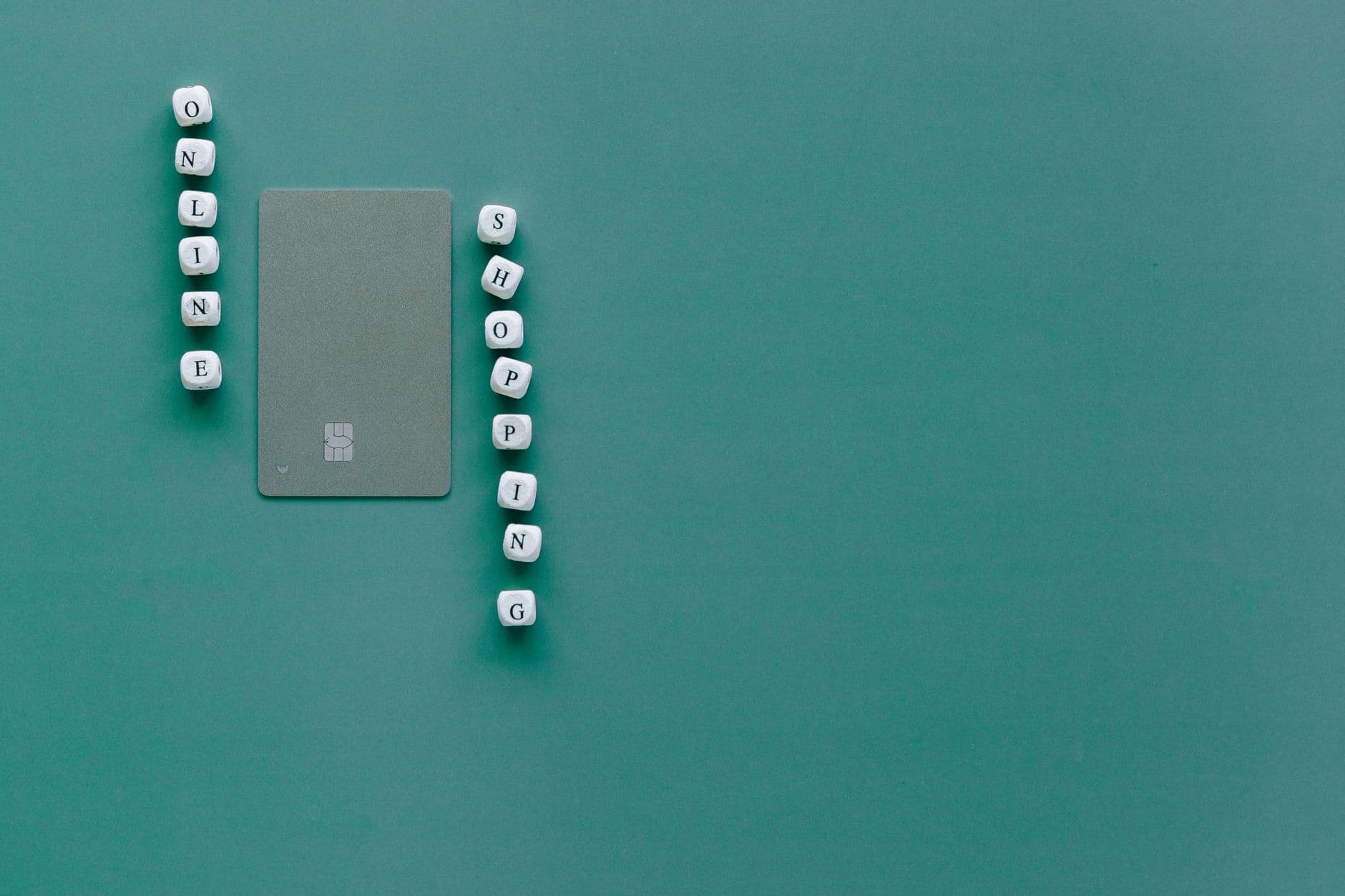Green background with bank card and letter blocks spelling 'Online Shopping'.